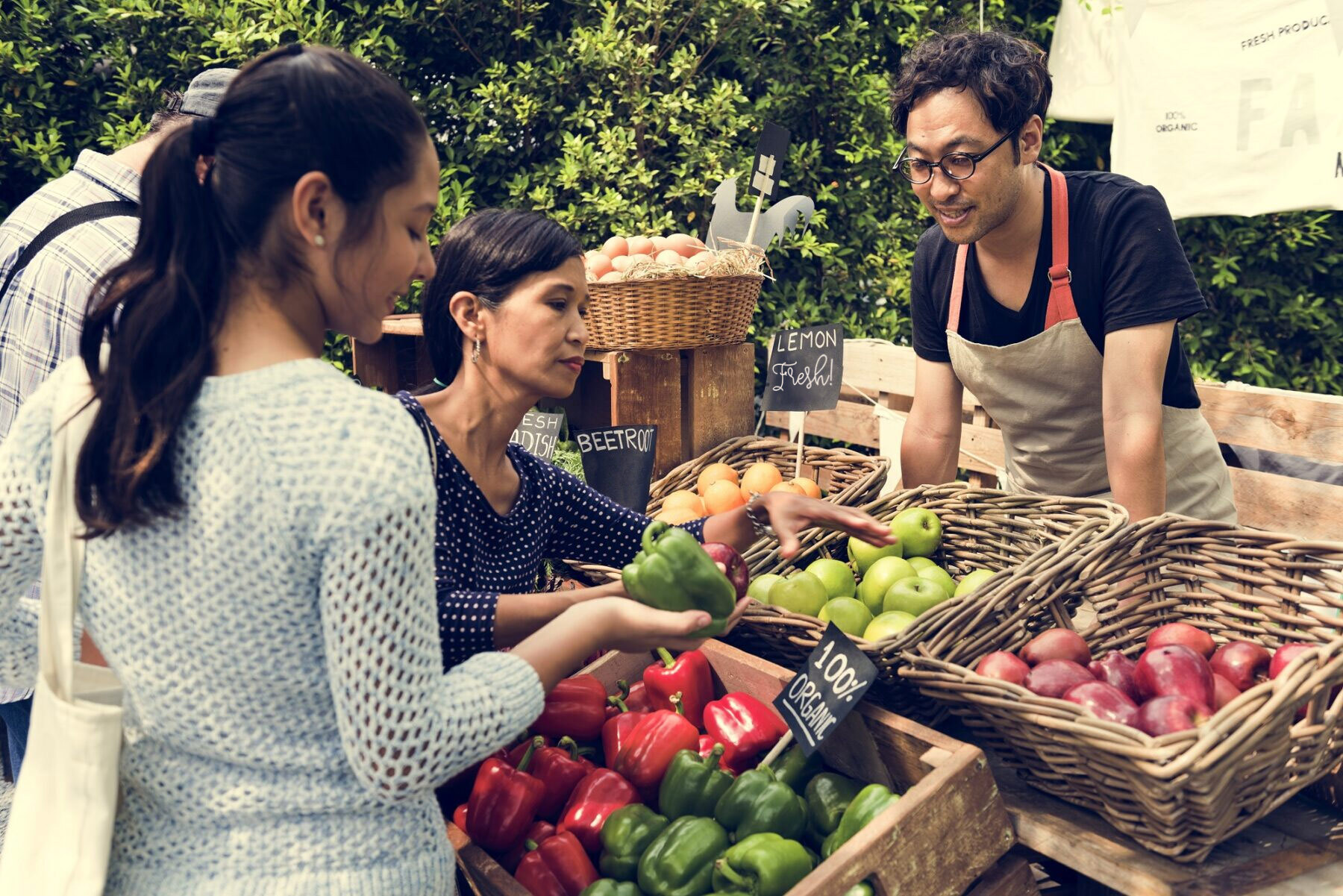 Fresh fruit in a farmers market with customers