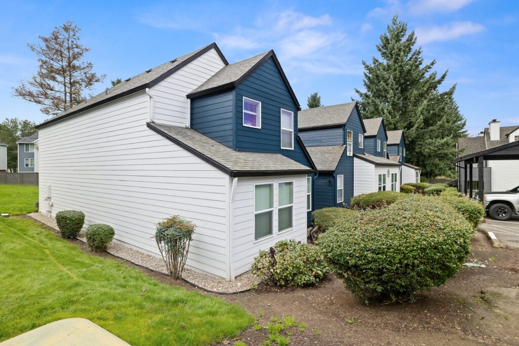 Building exterior with covered parking and reserved spaces